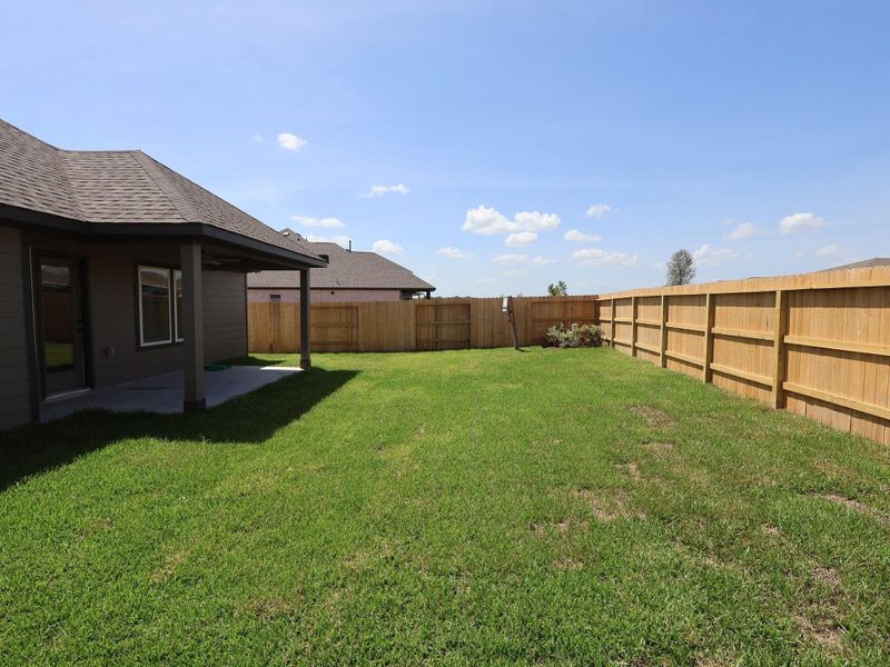 Exterior details and patio area of a home in Hallimore Ranch, Rosenberg (Image 21). Exterior details and patio area of a home in Hallimore Ranch, Rosenberg (Image 21).