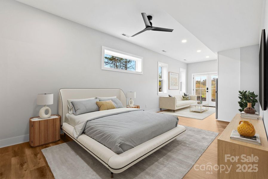 Virtually Staged - Luxury Vinyl Plank Flooring runs throughout the lower level including this in-law studio.