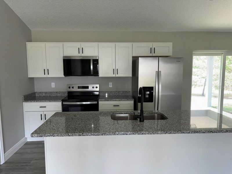 Furnished interior view inside a new home in , Dunnellon (Image 10).