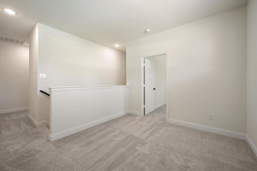 Hallway beyond stairs leads to LARGE Landing, Laundry & Additional Bedrooms