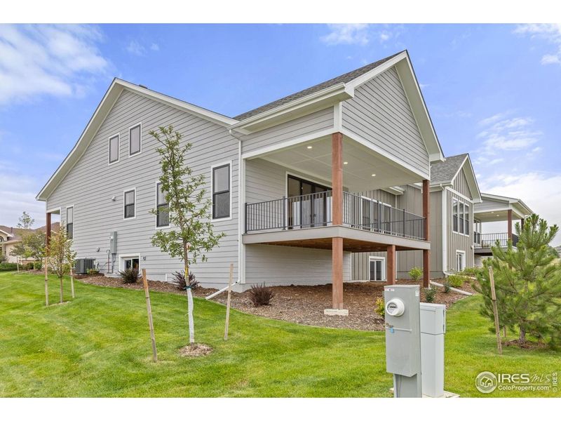 Exterior details and patio area of a home in Cottages at Kelly Farm, Greeley (Image 20).