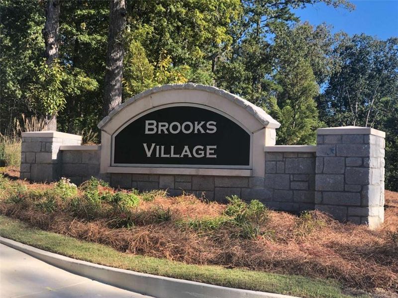 Front exterior of a new home in Brooks Village, Dacula, GA, highlighting curb appeal (Image 24).