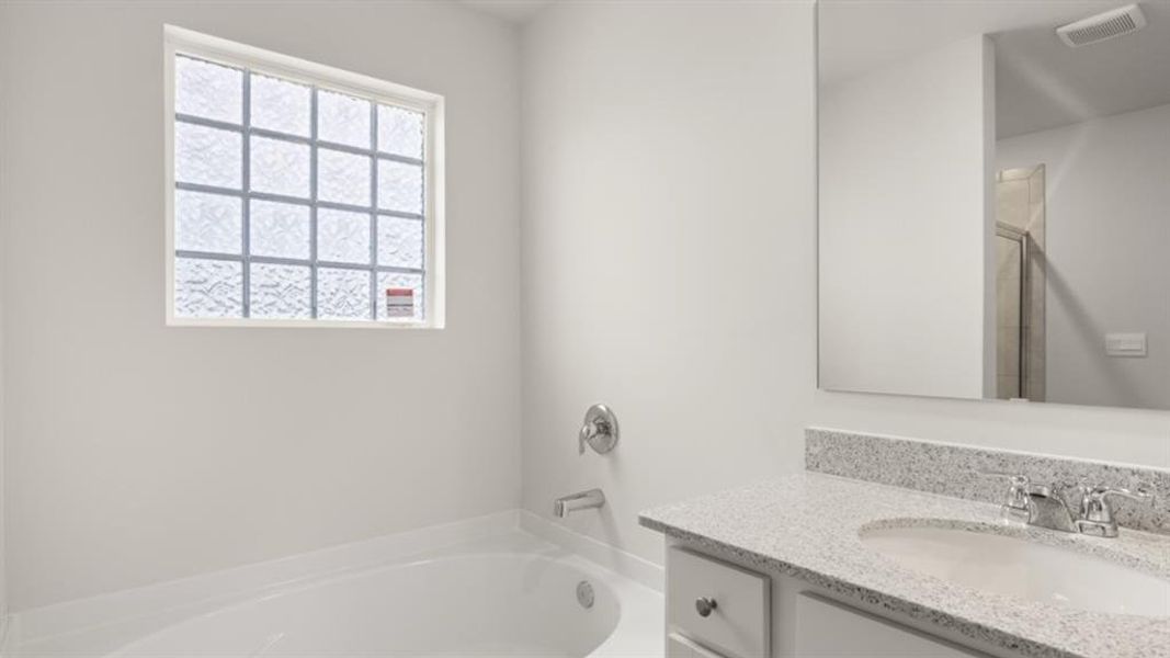 Furnished interior view inside a new home in Fairway 17 at Mirror Lake, Villa Rica (Image 10).