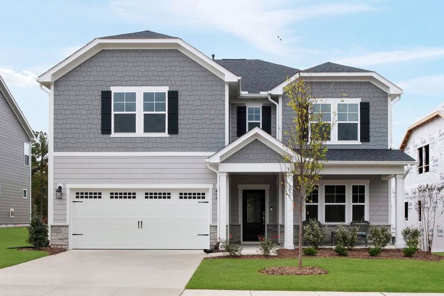 Representative exterior photo of a completed home built from the Sheridan by Taylor Morrison in Hickory Grove, Sanford, NC (Image 1). Representative exterior photo of a completed home built from the Sheridan by Taylor Morrison in Hickory Grove, Sanford, NC (Image 1).