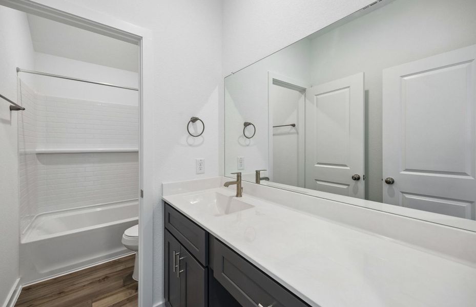 Furnished interior view inside a new home in Ellerden, Tomball (Image 5).