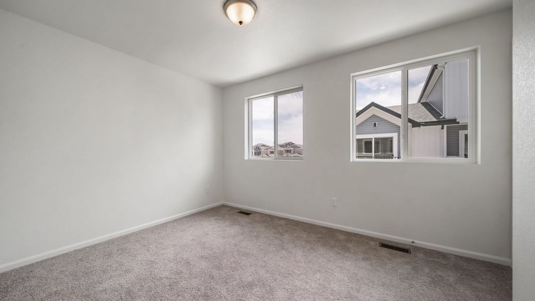 Spacious, unfurnished interior of a new home in Banning Lewis Ranch, Colorado Springs (Image 11).