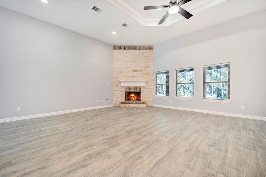 Wood burning fireplace is between the windows on this new homesample is between the windows instead