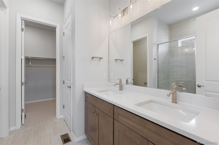 Furnished interior view inside a new home in The Manors Collection at Golden Overlook, Lakewood (Image 10).
