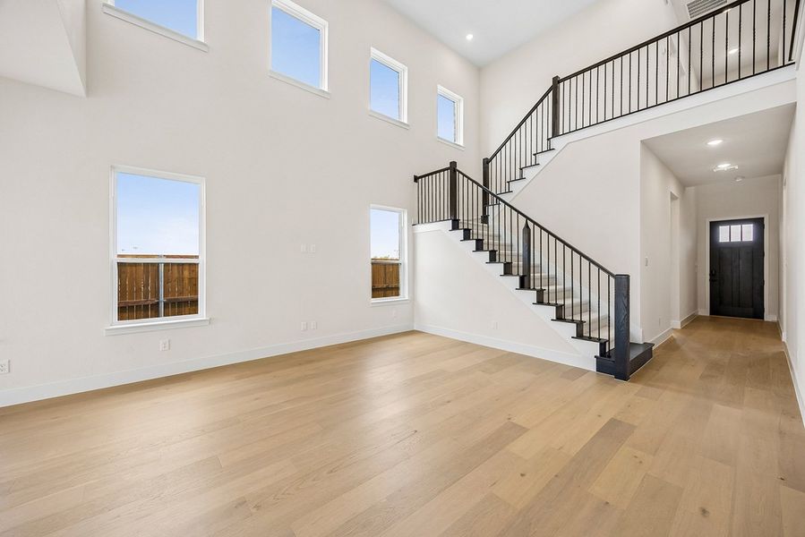 Representative unfurnished interior of a home built from the Mirella by Landon Homes in Fields - East Village, Frisco (Image 16). Representative unfurnished interior of a home built from the Mirella by Landon Homes in Fields - East Village, Frisco (Image 16).