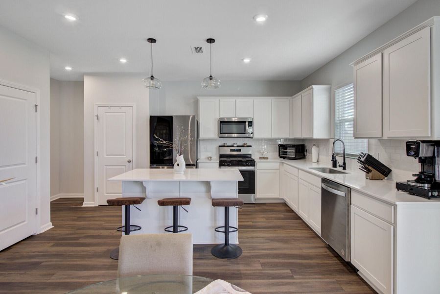 Furnished interior view inside a new home in Sanctuary Cove at Cane Bay, Summerville (Image 38).