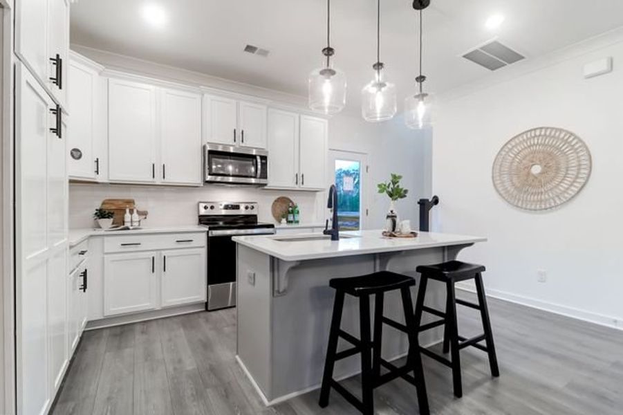 Representative furnished interior of a home built from the Charlotte by True Homes in Reeves Crossing, St. George (Image 2).