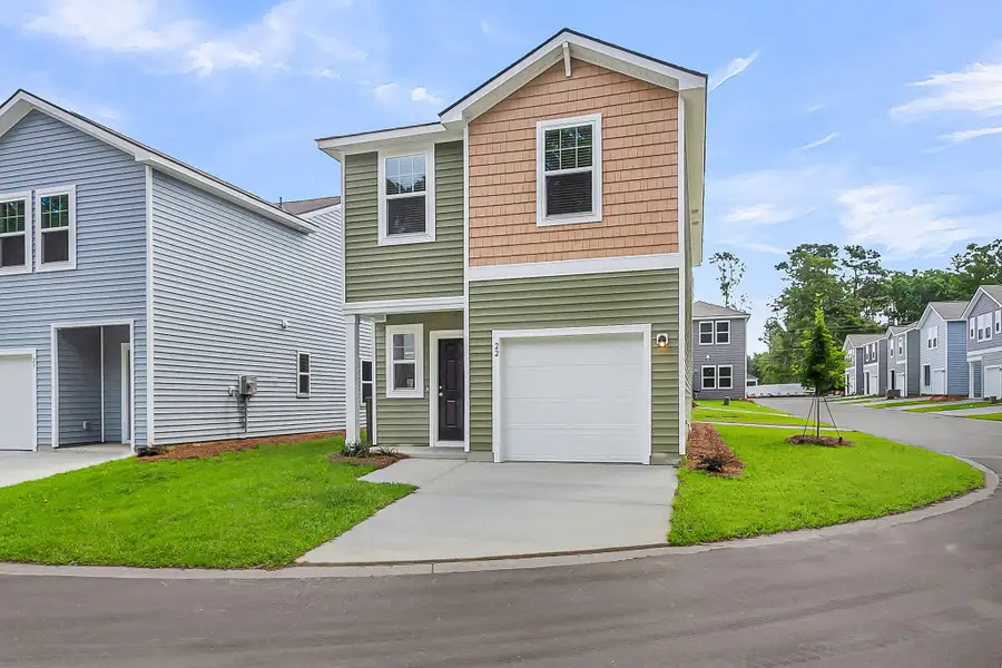 Front exterior of a new home in Pinckney Place, North Charleston, SC, highlighting curb appeal (Image 15).
