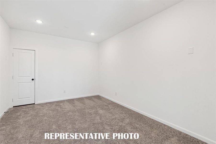 This spacious media room is adjacent to the game room creating the ultimate family entertainment area! REPRESENTATIVE PHOTO This spacious media room is adjacent to the game room creating the ultimate family entertainment area! REPRESENTATIVE PHOTO