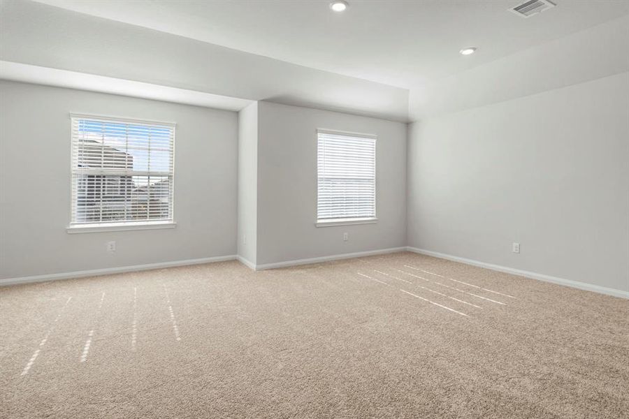 The master bedroom is huge! Look at all of this space for a bed and reading nook.