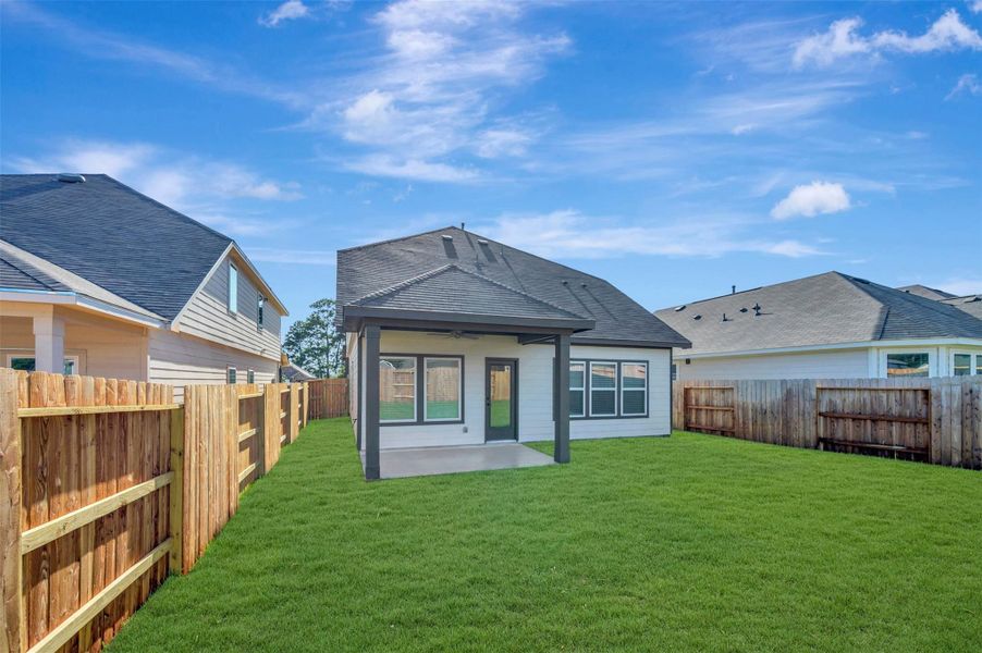 Exterior details and patio area of a home in Lone Star Landing, Montgomery (Image 3). Exterior details and patio area of a home in Lone Star Landing, Montgomery (Image 3).