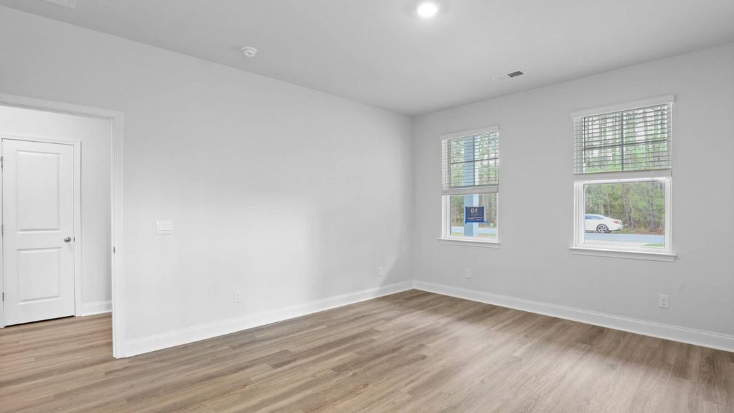 Representative unfurnished interior of a home built from the DRAYTON by D.R. Horton in Rivers Reach, Yemassee (Image 15).