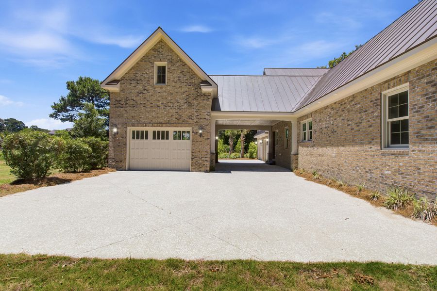 Exterior details and patio area of a home in , Johns Island (Image 26).