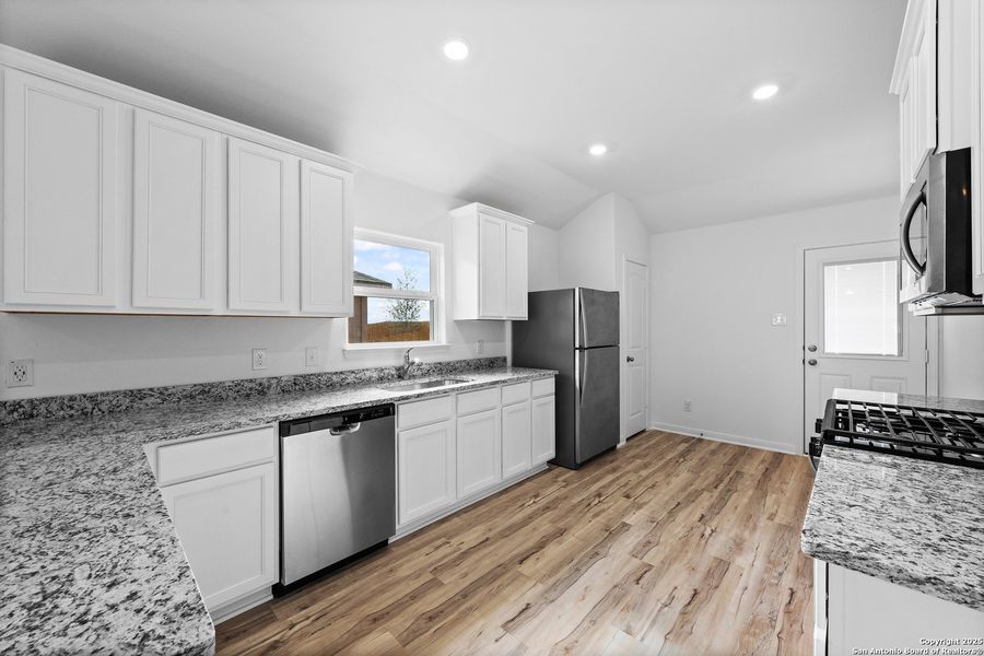 Furnished interior view inside a new home in Preserve at Medina, Von Ormy (Image 4).