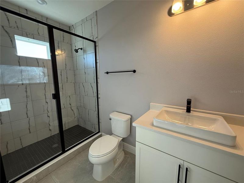 Furnished interior view inside a new home in Laureate Park, Orlando (Image 11).