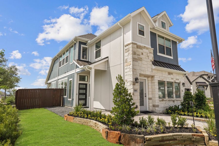 Front exterior of a new home in Bridgeland, Cypress, TX, highlighting curb appeal (Image 29).