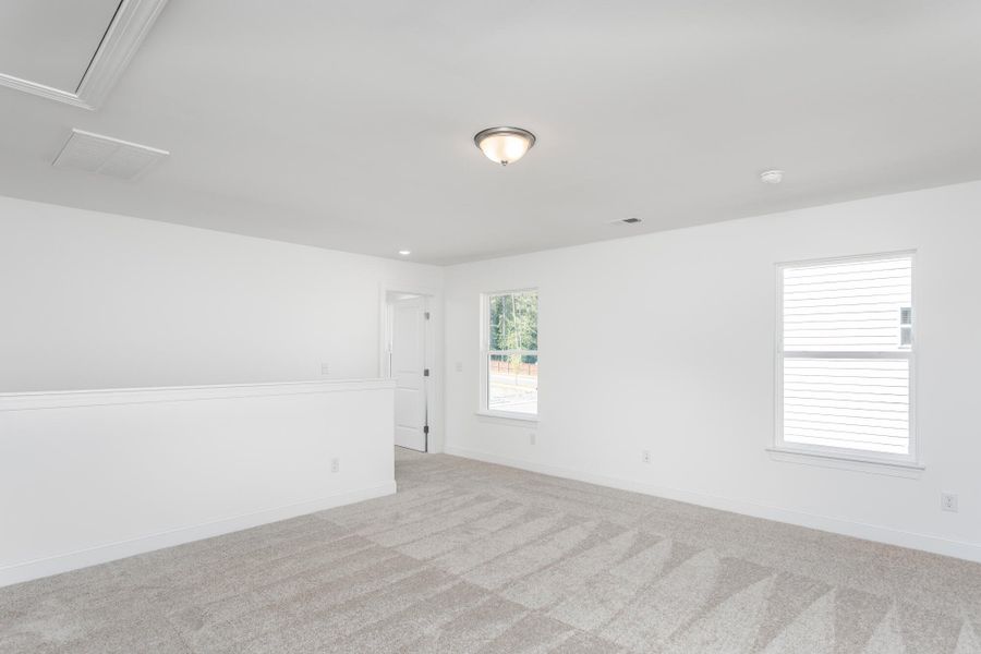 Spacious, unfurnished interior of a new home in Running Brook Townes, Durham (Image 13).