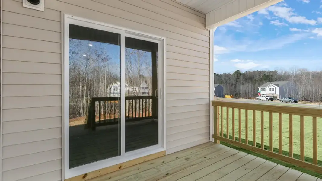 Exterior details and patio area of a home in Baker Farm, Youngsville (Image 3).