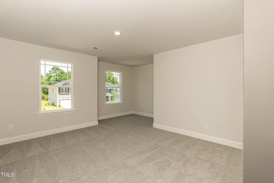 Representative unfurnished interior of a home built from the 2709 by Adams Homes in The Grove at Ballard, Jacksonville (Image 35).