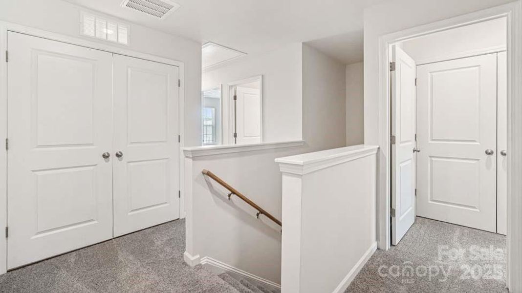 Furnished interior view inside a new home in Mallard Creek Townhomes, Charlotte (Image 8). Furnished interior view inside a new home in Mallard Creek Townhomes, Charlotte (Image 8).