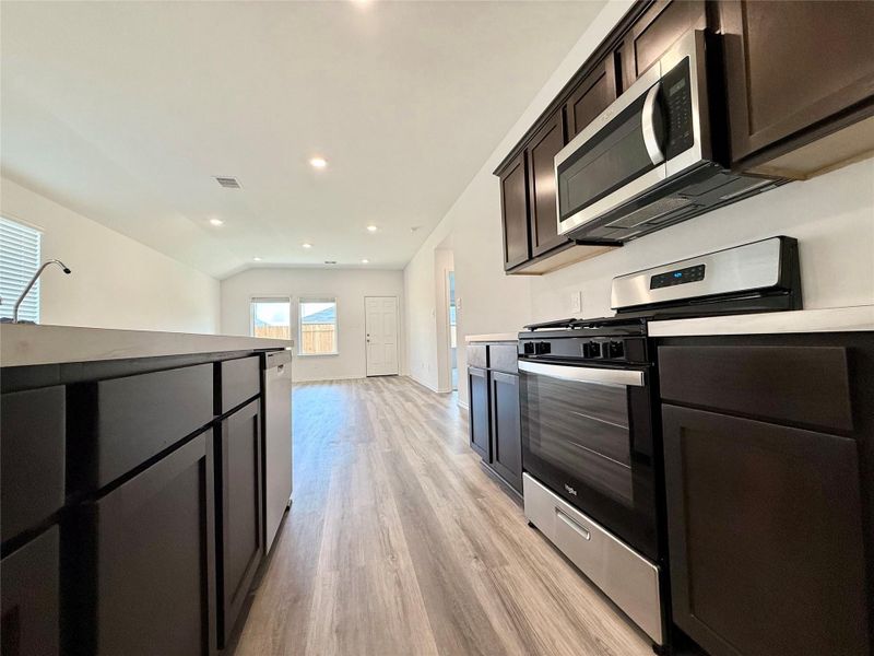 All stainless steel appliances convey with the sale.
