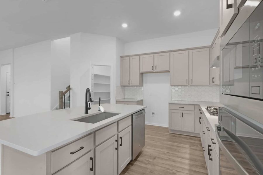 Furnished interior view inside a new home in Highland Village, Georgetown (Image 5).