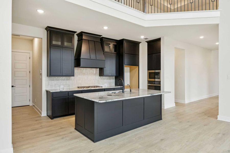 Furnished interior view inside a new home in The Grove Frisco, Frisco (Image 3).