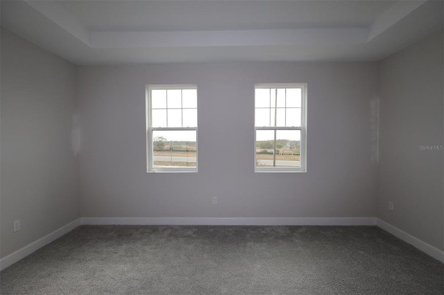 Spacious, unfurnished interior of a new home in Lake Star at Ovation, Winter Garden (Image 8).