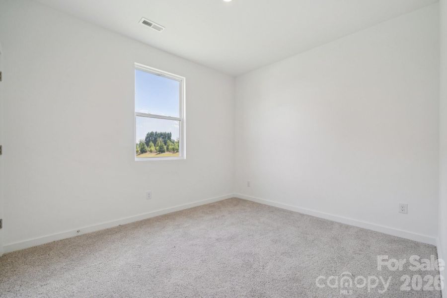 Spacious, unfurnished interior of a new home in Meadow Creek Village, Locust (Image 15).