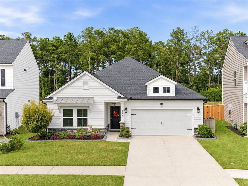 Front exterior of a new home in , Moncks Corner, SC, highlighting curb appeal (Image 26). Front exterior of a new home in , Moncks Corner, SC, highlighting curb appeal (Image 26).