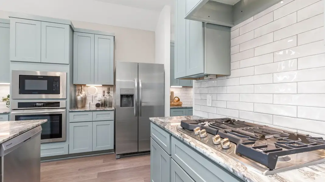 Furnished interior in a model home at Davis Harbor in League City (Image 6).