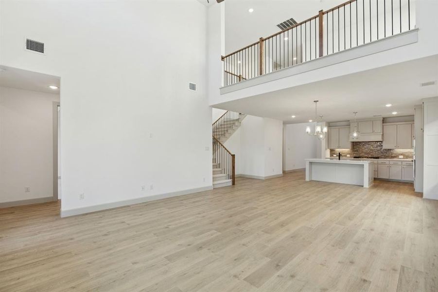 With the upstairs game room open the main family room, you'll enjoy multi-level entertaining in our Percy plan. With the upstairs game room open the main family room, you'll enjoy multi-level entertaining in our Percy plan.