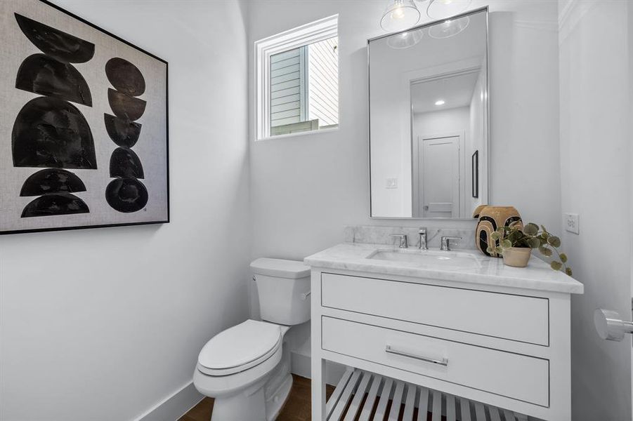 Bathroom featuring toilet and vanity