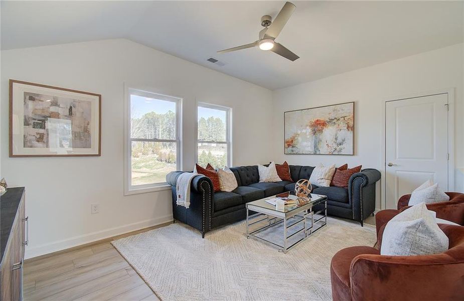 Furnished interior view inside a new home in Courtyards at Traditions, Cumming (Image 35).