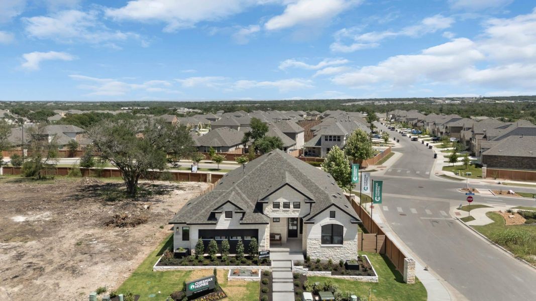 Front exterior of a new home in Highland Village, Georgetown, TX, highlighting curb appeal (Image 30). Front exterior of a new home in Highland Village, Georgetown, TX, highlighting curb appeal (Image 30).