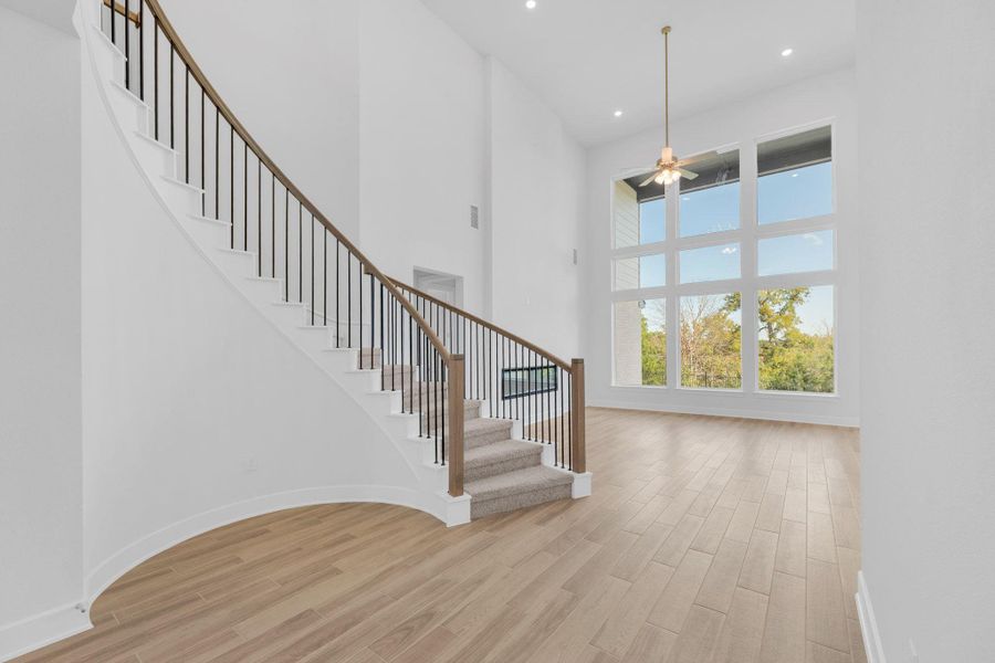 Spacious, unfurnished interior of a new home in Santa Rita Ranch - 60', Liberty Hill (Image 20). Spacious, unfurnished interior of a new home in Santa Rita Ranch - 60', Liberty Hill (Image 20).