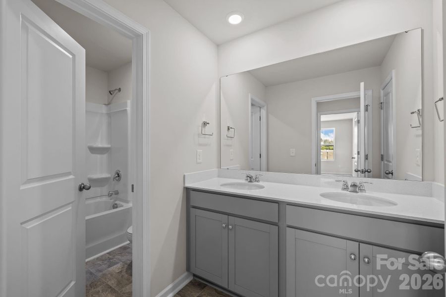 Furnished interior view inside a new home in McFarland Estates, York (Image 13).