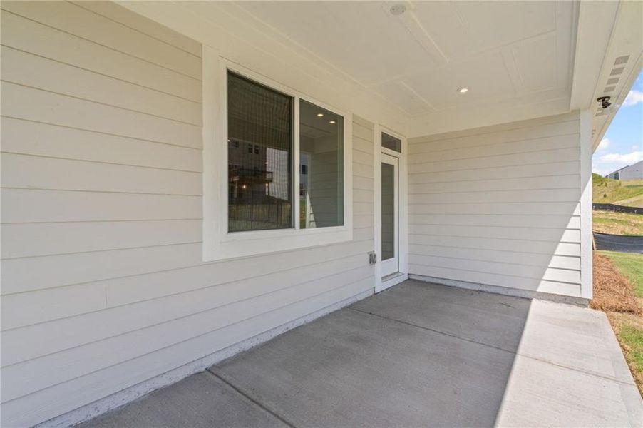 Front exterior of a new home in Twin Lakes, Hoschton, GA, highlighting curb appeal (Image 1). Front exterior of a new home in Twin Lakes, Hoschton, GA, highlighting curb appeal (Image 1).