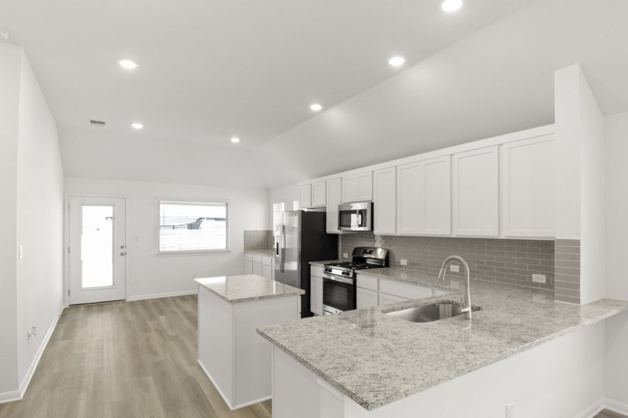 Furnished interior view inside a new home in Crosswinds, Kyle (Image 8).