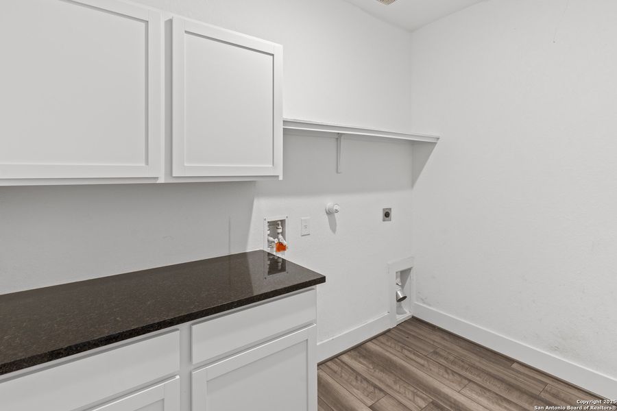 Furnished interior view inside a new home in Hickory Ridge, Elmendorf (Image 9).