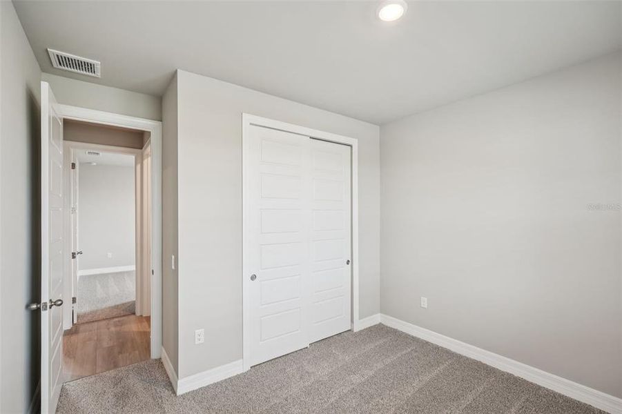 Spacious, unfurnished interior of a new home in Crescent Lakes - Signature Series, Punta Gorda (Image 16).