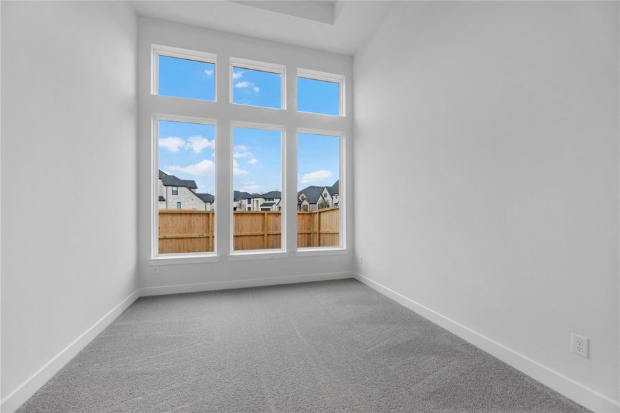 Spacious, unfurnished interior of a new home in Sienna, Missouri City (Image 13).
