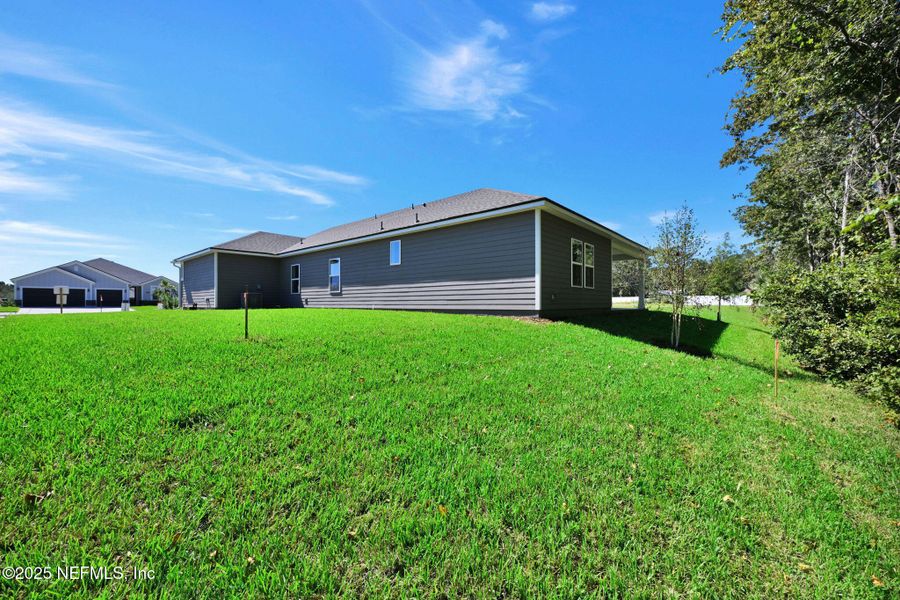 Exterior details and patio area of a home in McGirt's Creek, Yulee (Image 19).