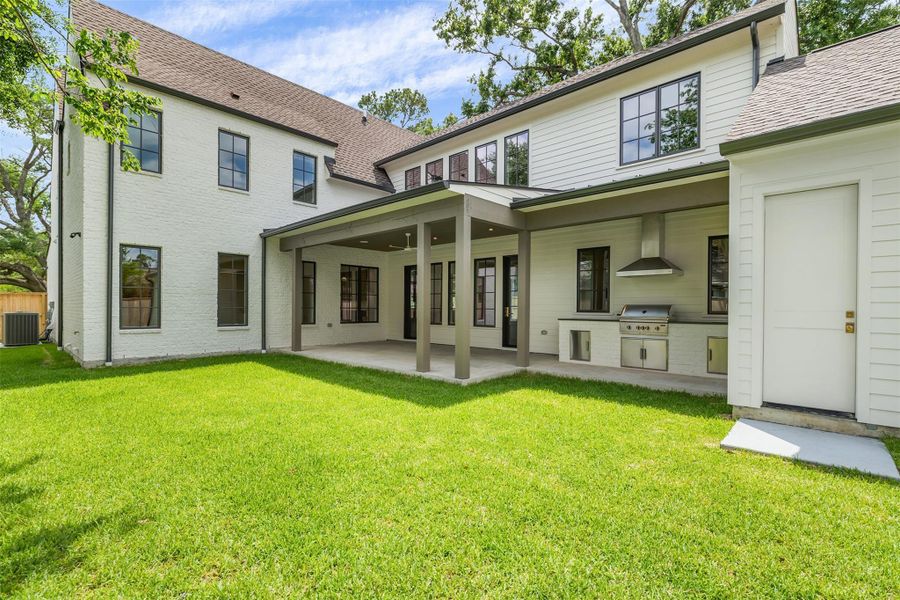 Exterior details and patio area of a home in , Houston (Image 3).