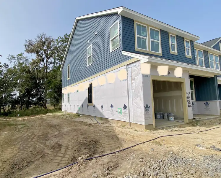 Front exterior of a new home in Tributary At The Park At Rivers Edge, North Charleston, SC, highlighting curb appeal (Image 2).