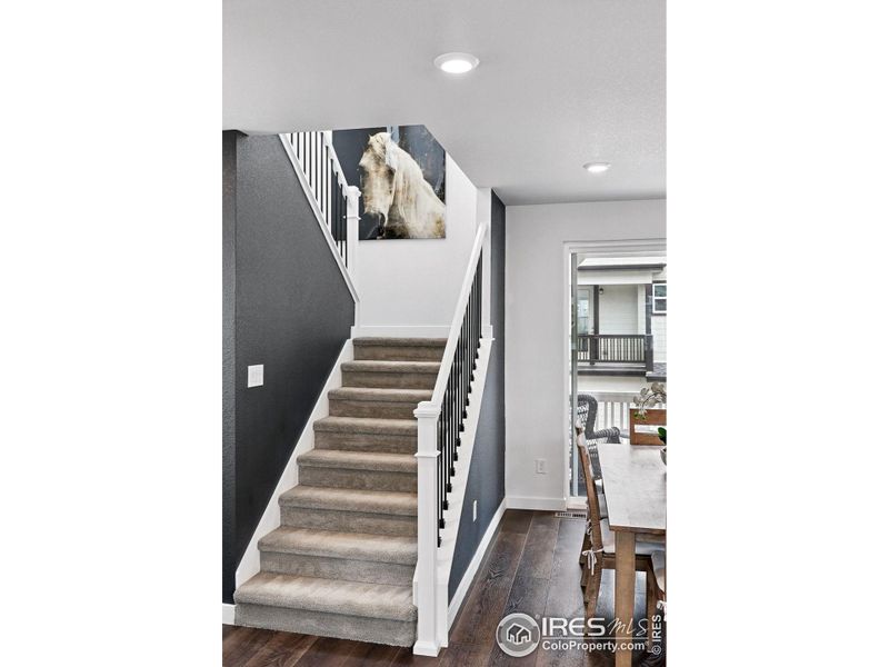 Stairs to bedrooms, Laundryl, and Loft area